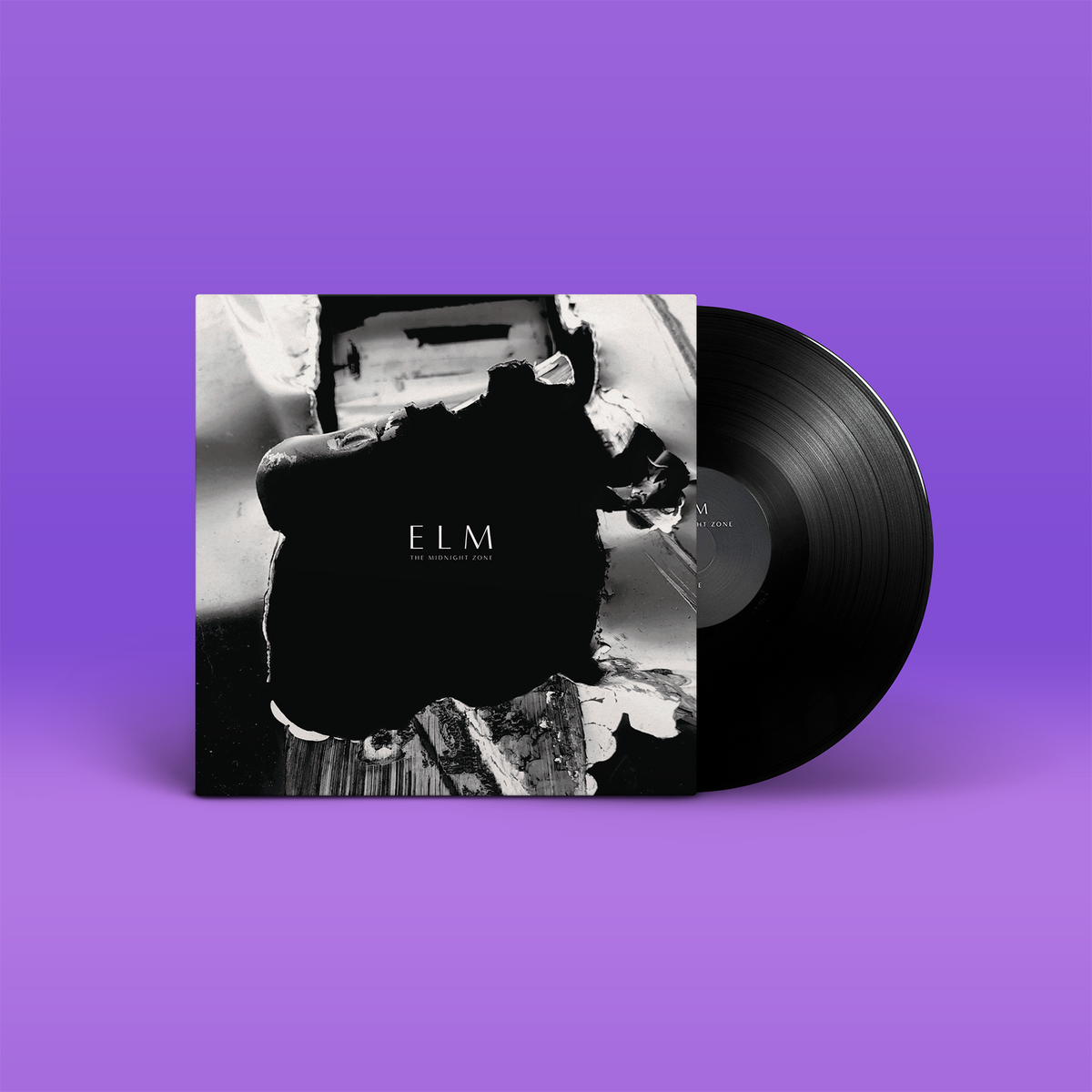 Das Album "The Midnight Zone" von ELM auf Vinyl. Schwarz-weißes Cover, Schwarze Schallplatte.