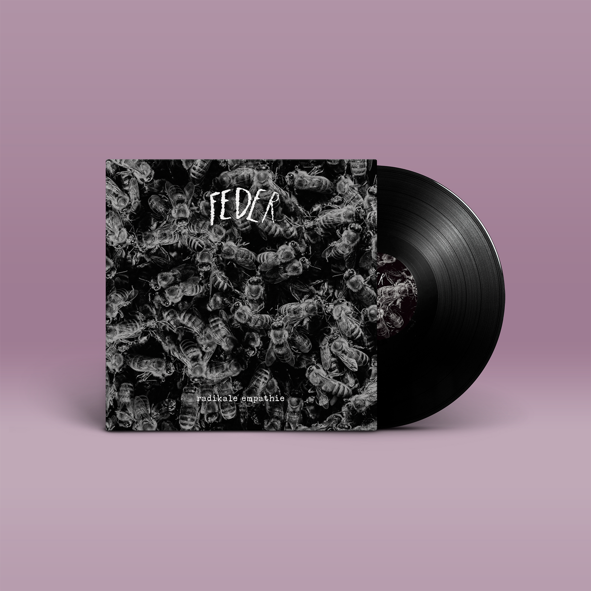 Das Album "radikale empathie von Feder. Schwarz-weißes Cover mit Bienenmotiv, schwarze Vinyl.