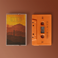 Das Album "Hiru" der Band "Ilun". Gelb-braunes-Cover, oranges Tape.