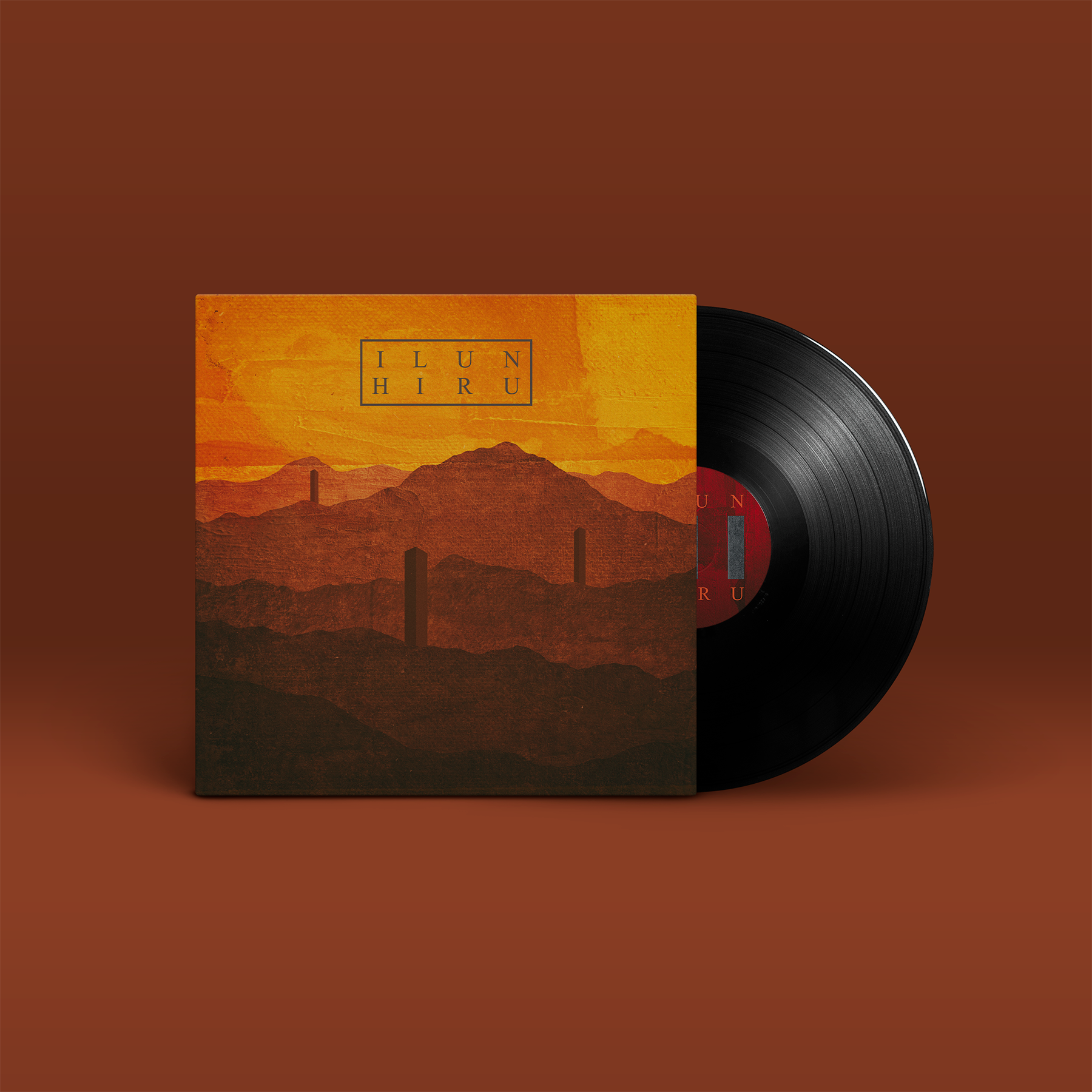 Das Album "Hiru" der Band "Ilun". Gelb-braunes-Cover, schwarze Schallplatte.