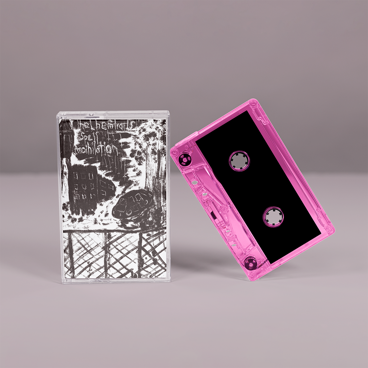 "The Chemtrails Spell Annihilation" von "The Goatjuring auf Tape. Schwarz-weißes Tape-Cover, Pink-transparentes Tape.