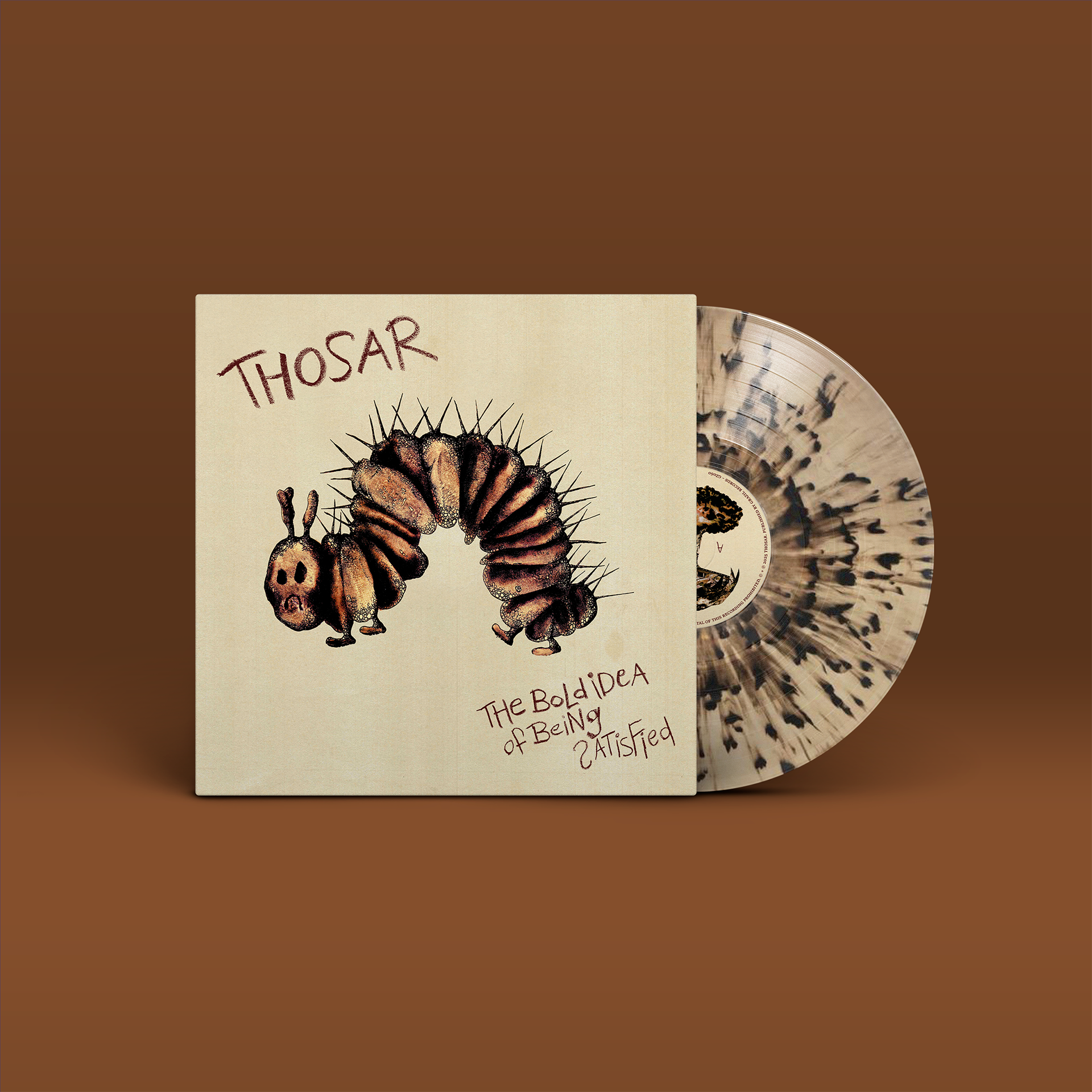 "The Bold Idea of Being Satisfied" von "Thosar auf Vinyl. Beiges Cover mit braunem Motiv, beige-braune Splatter-Schallplatte.