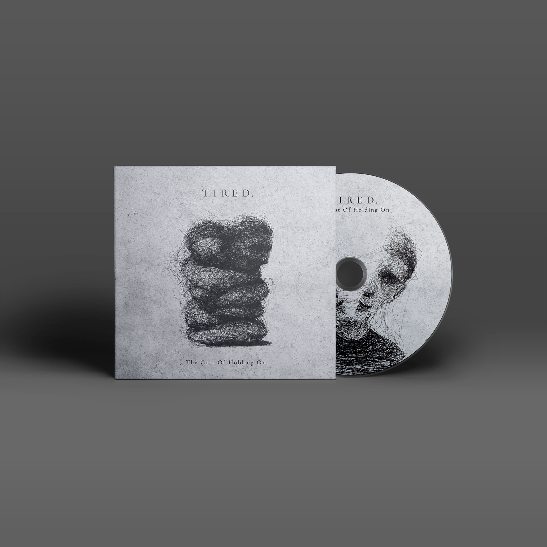 "The Cost Of Holding On" von "Tired." auf CD. Graues Cover mit schwarzem Motiv, graue CD mit schwarzem Motiv.